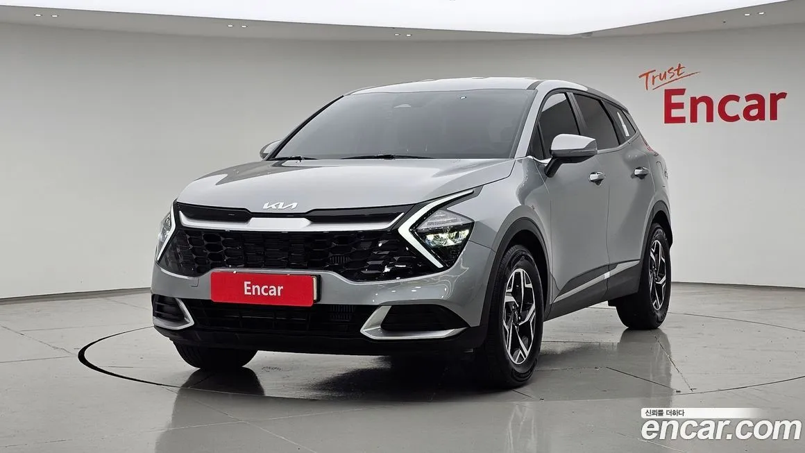 Kia Sportage — фото 1