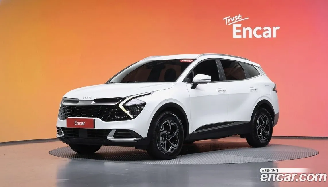 Kia Sportage — фото 1