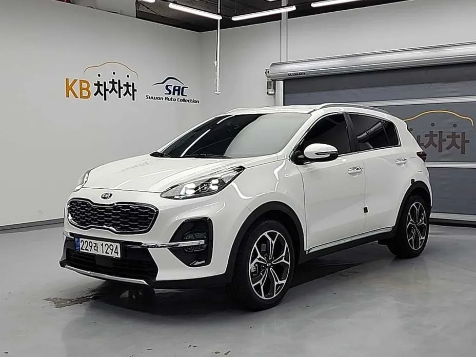 Kia Sportage — фото 1