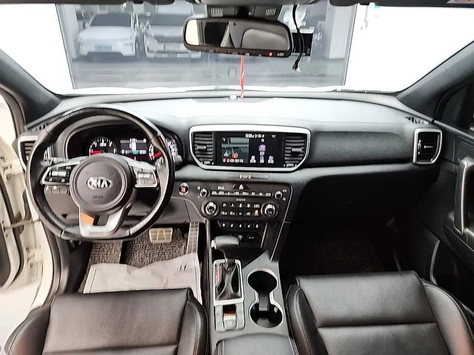 Kia Sportage — фото 6