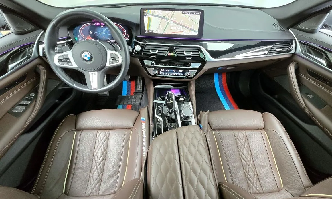 BMW 5-Series — фото 10