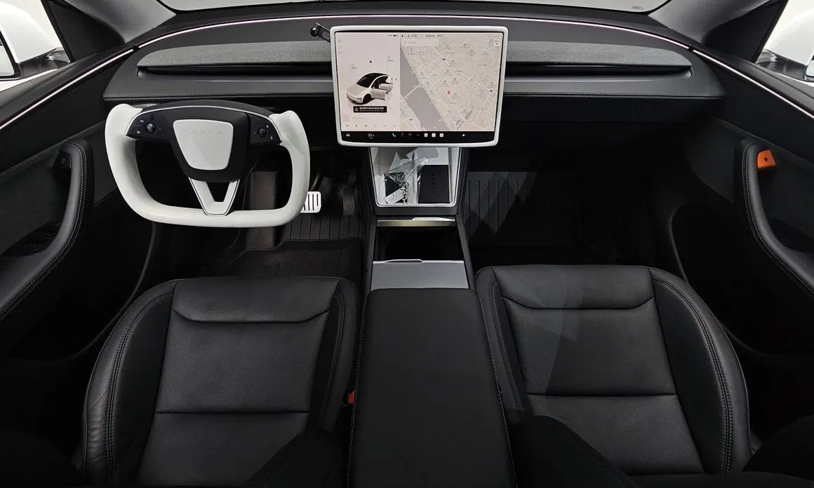 Tesla Model Y — фото 9