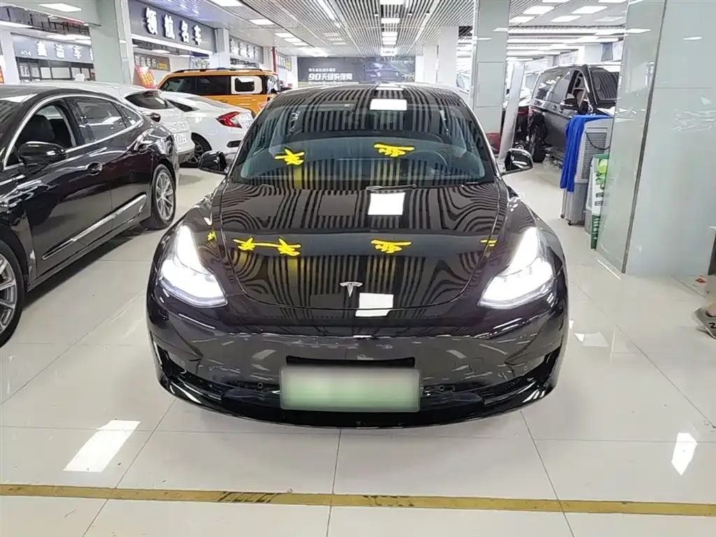 Tesla Model 3 — фото 9