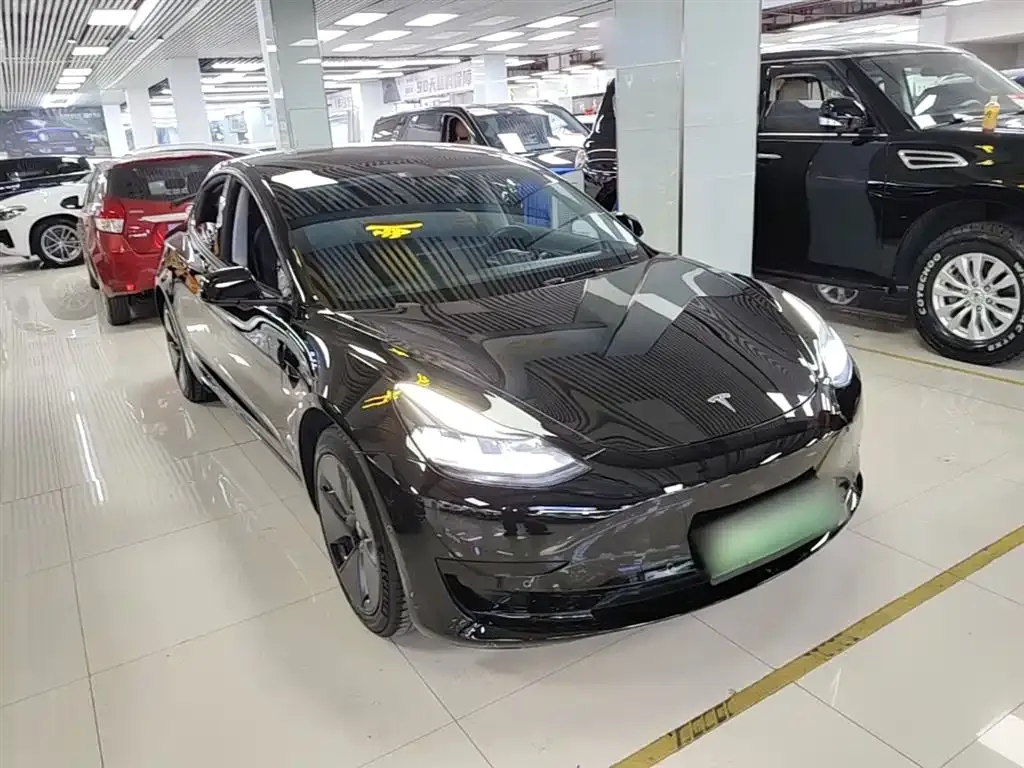 Tesla Model 3 — фото 5