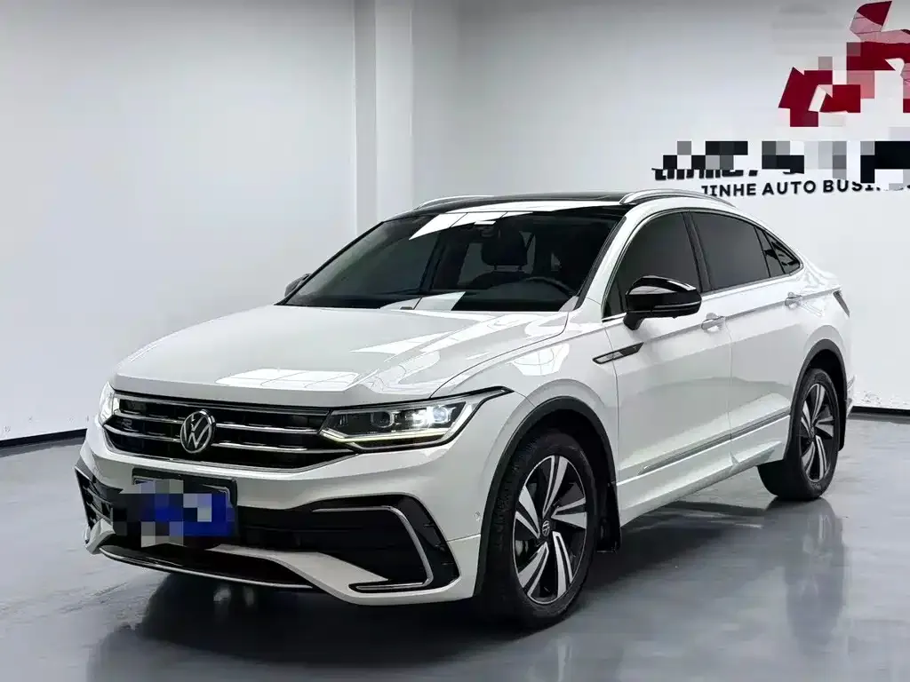 Volkswagen Tiguan L — фото 1