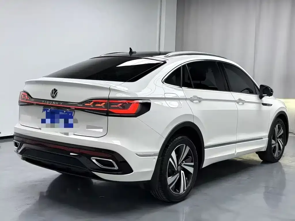 Volkswagen Tiguan L — фото 5