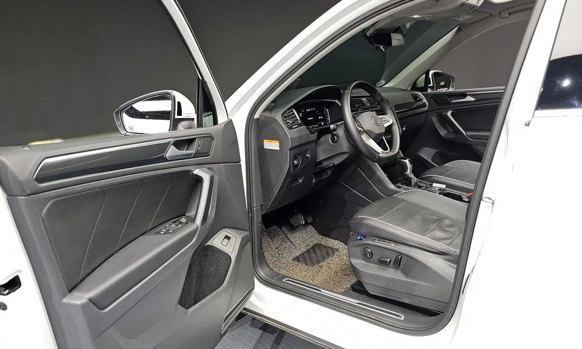 Volkswagen Tiguan — фото 9