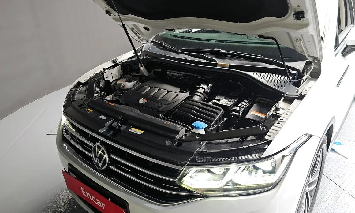Volkswagen Tiguan — фото 10