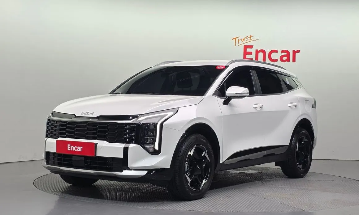 Kia Sportage — фото 1