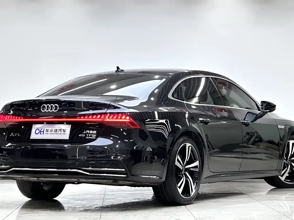 Audi A7L — фото 7