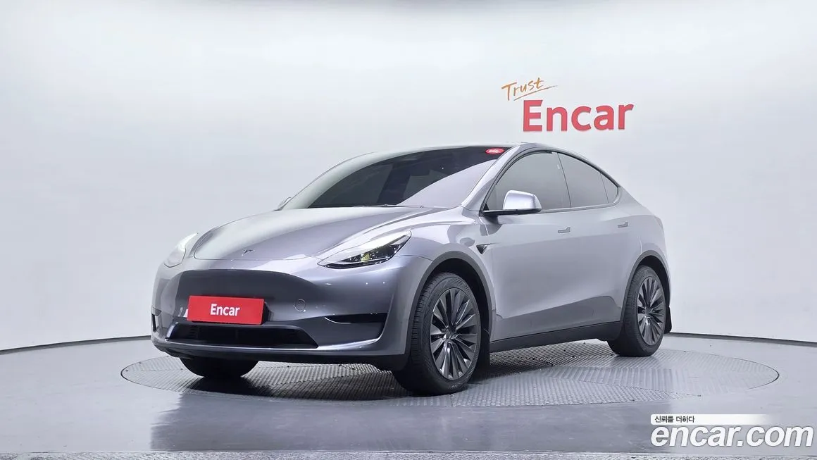 Tesla Model Y — фото 1
