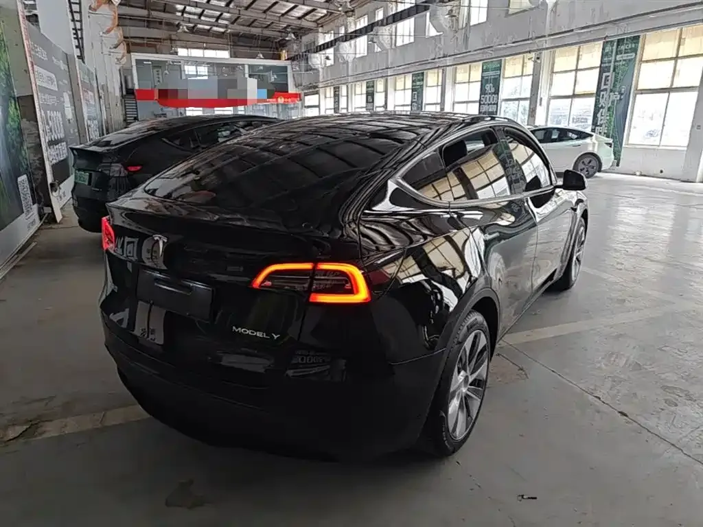 Tesla Model Y — фото 7