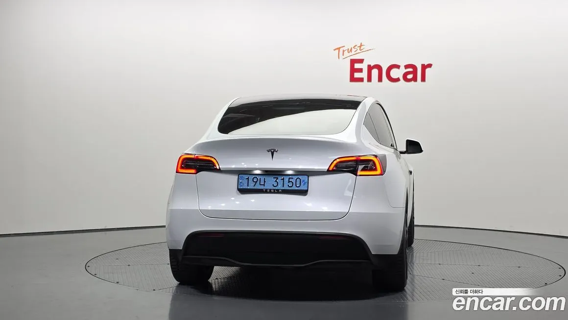 Tesla Model Y — фото 5