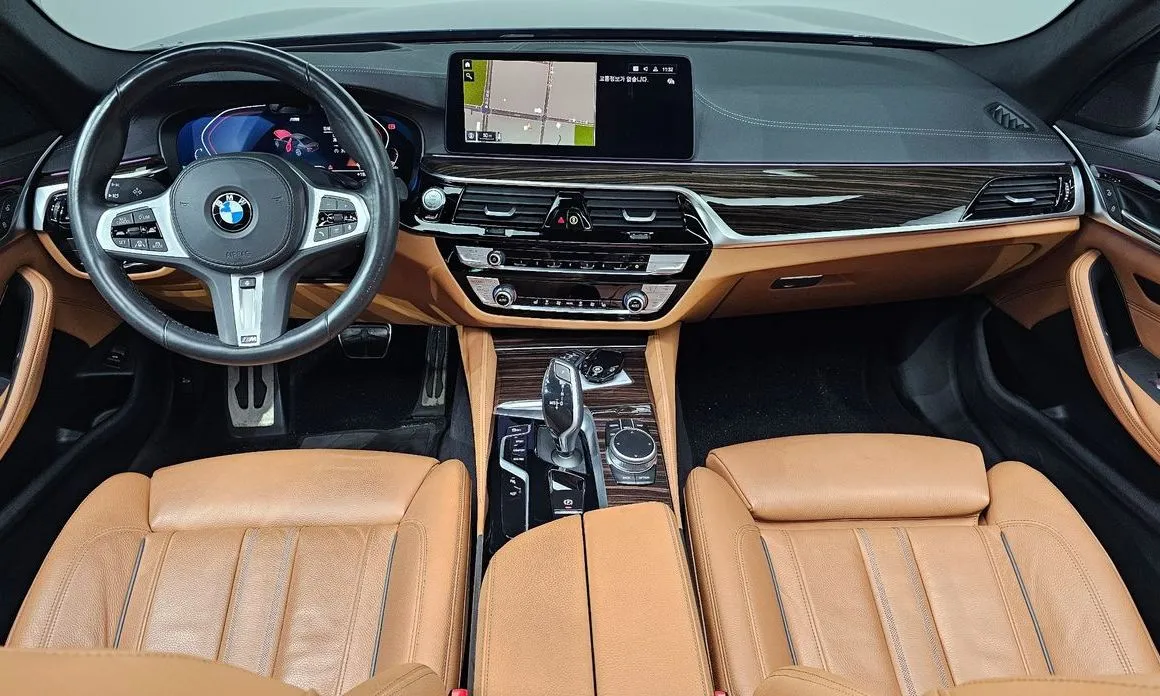 BMW 5-Series — фото 10