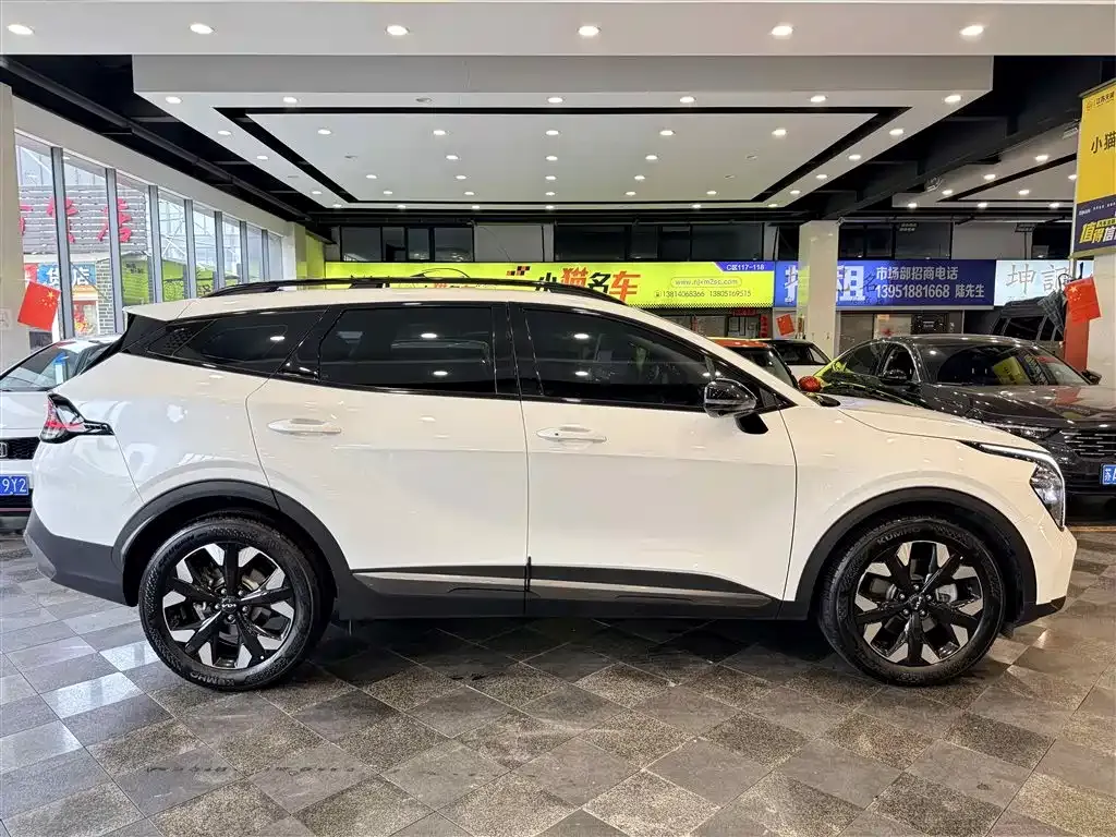 Kia Sportage — фото 10
