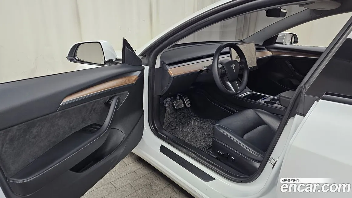 Tesla Model 3 — фото 7