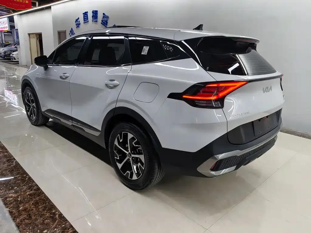 Kia Sportage — фото 10