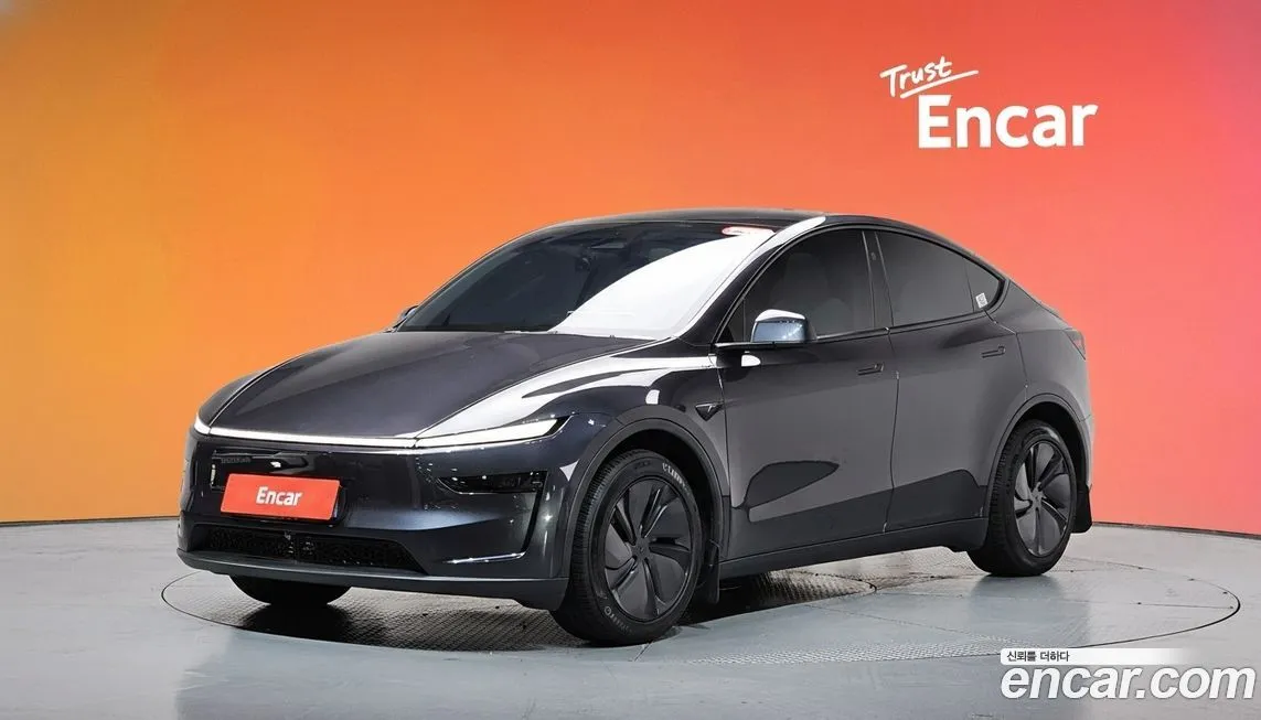 Tesla Model Y — фото 1