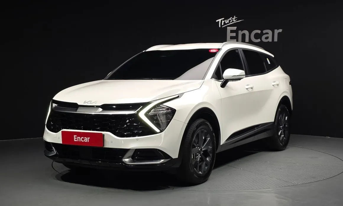 Kia Sportage — фото 1