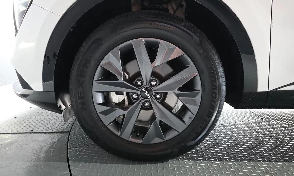 Kia Sportage — фото 10