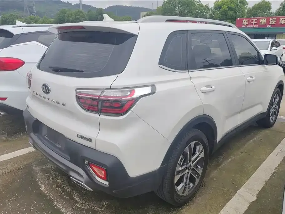 Kia Sportage — фото 7