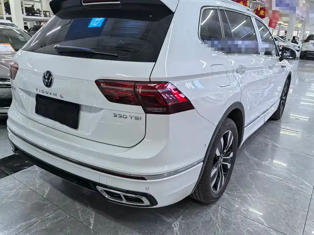 Volkswagen Tiguan L — фото 2