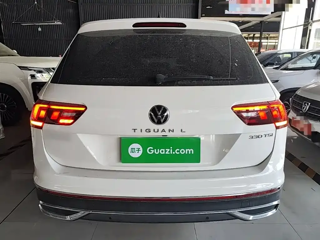 Volkswagen Tiguan L — фото 7