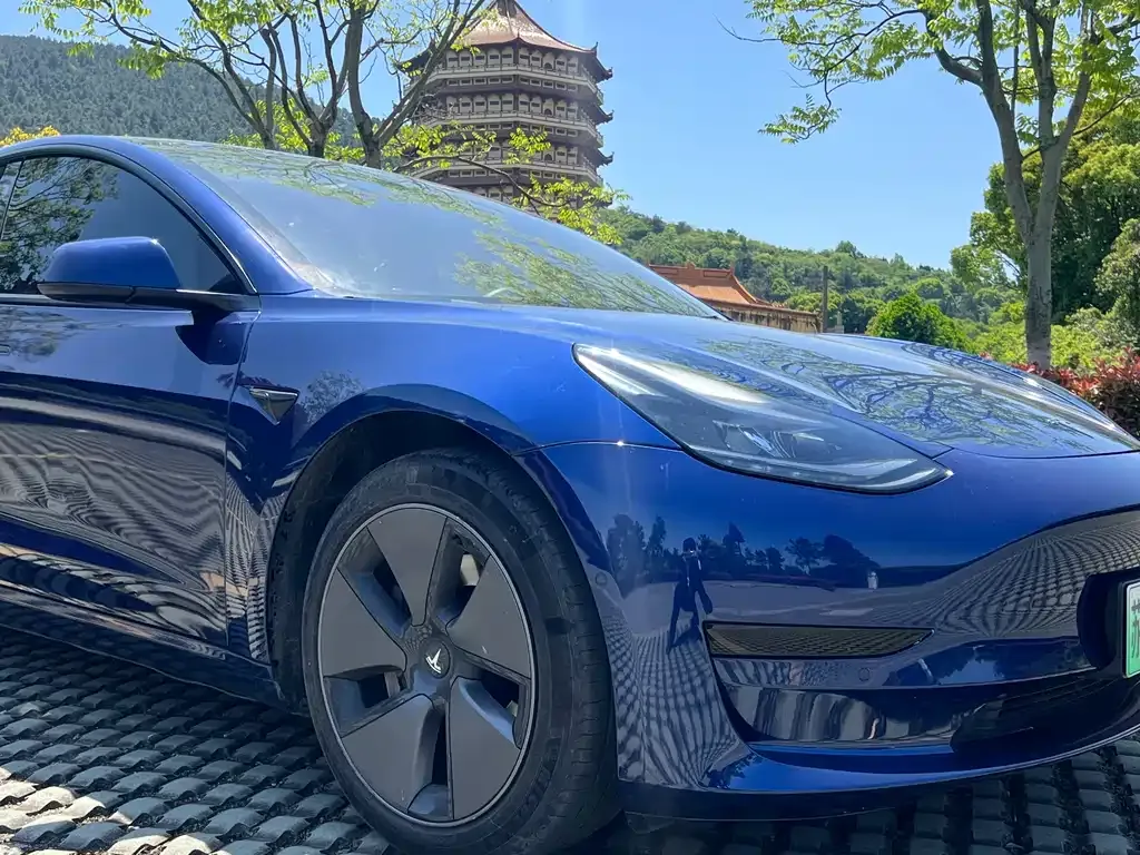 Tesla Model 3 — фото 10