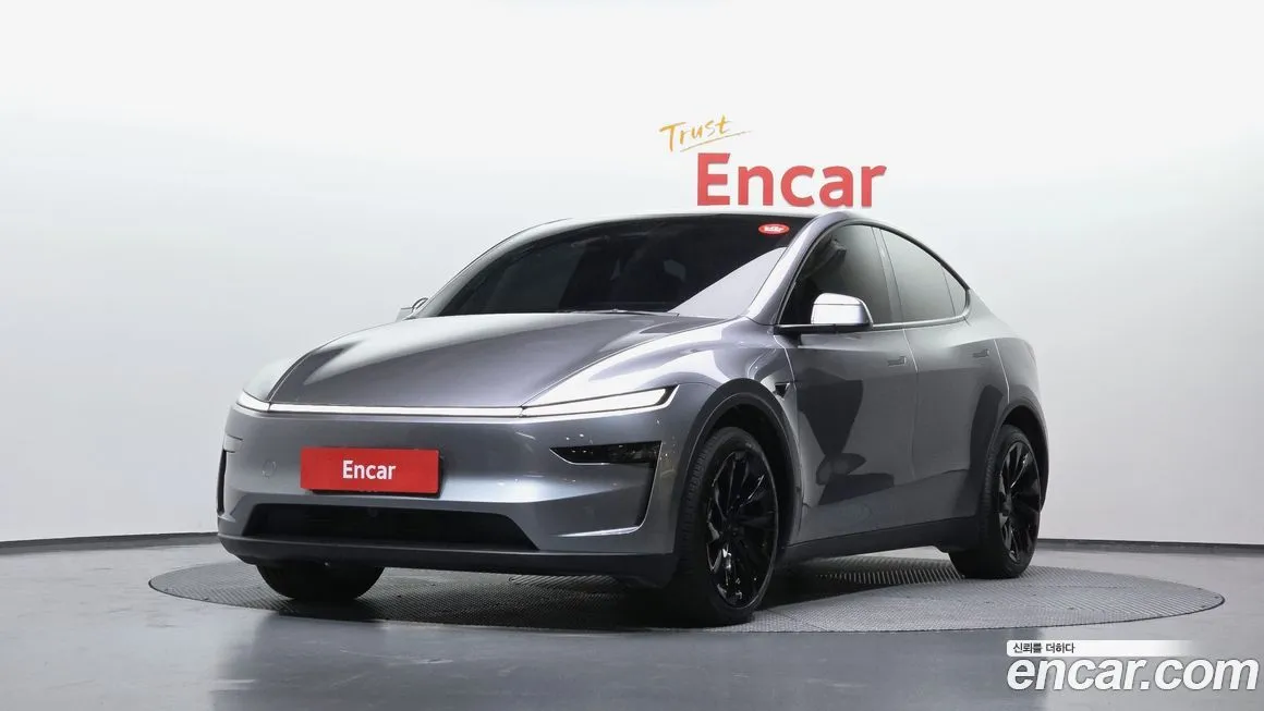 Tesla Model Y — фото 1