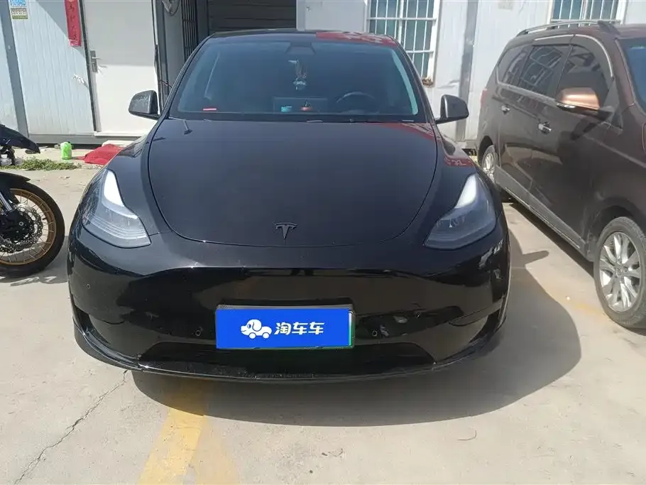 Tesla Model Y — фото 10