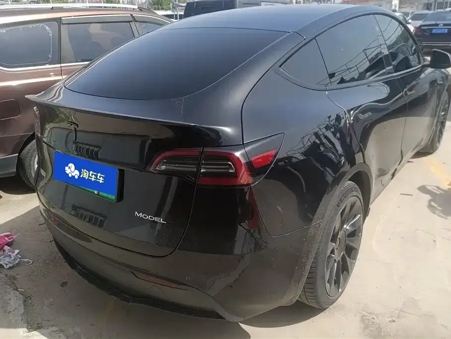 Tesla Model Y — фото 9