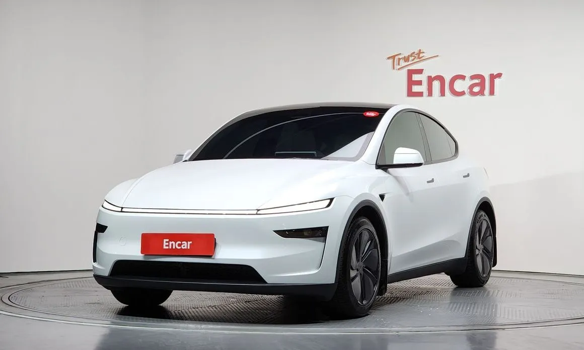 Tesla Model Y — фото 1