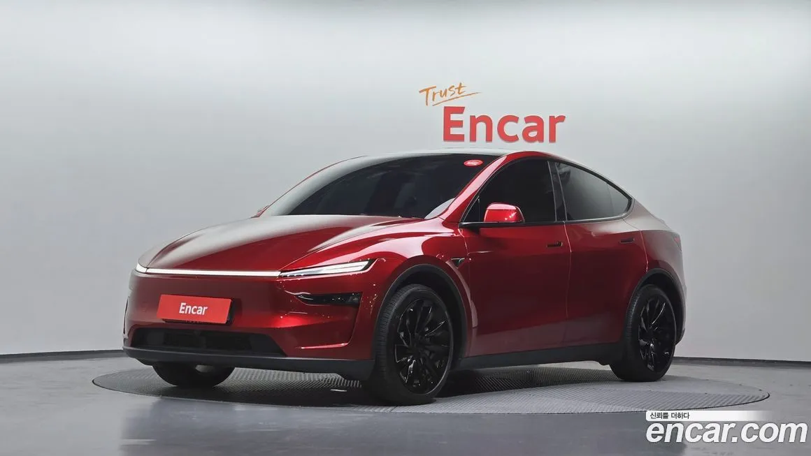 Tesla Model Y — фото 1