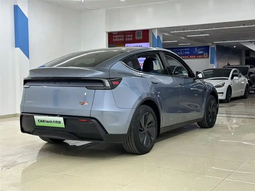 Tesla Model Y — фото 6