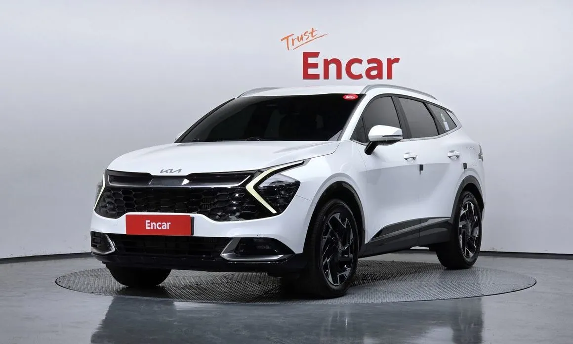 Kia Sportage — фото 1