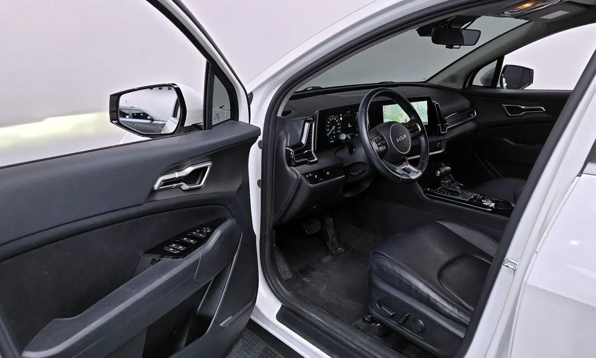 Kia Sportage — фото 7