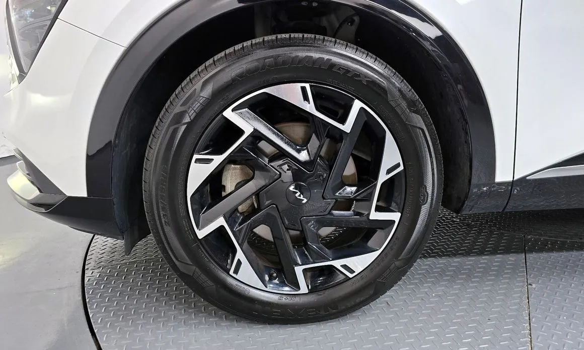 Kia Sportage — фото 10