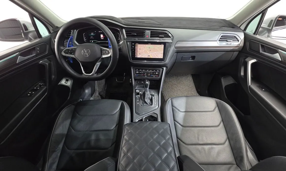 Volkswagen Tiguan — фото 10