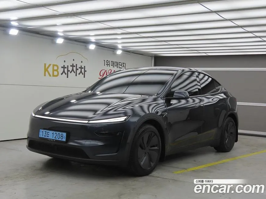 Tesla Model Y — фото 1