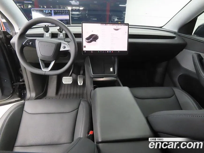 Tesla Model Y — фото 7