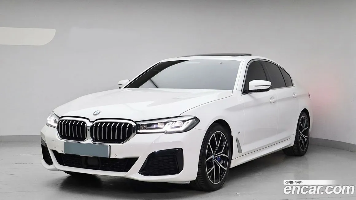 BMW 5-Series — фото 1
