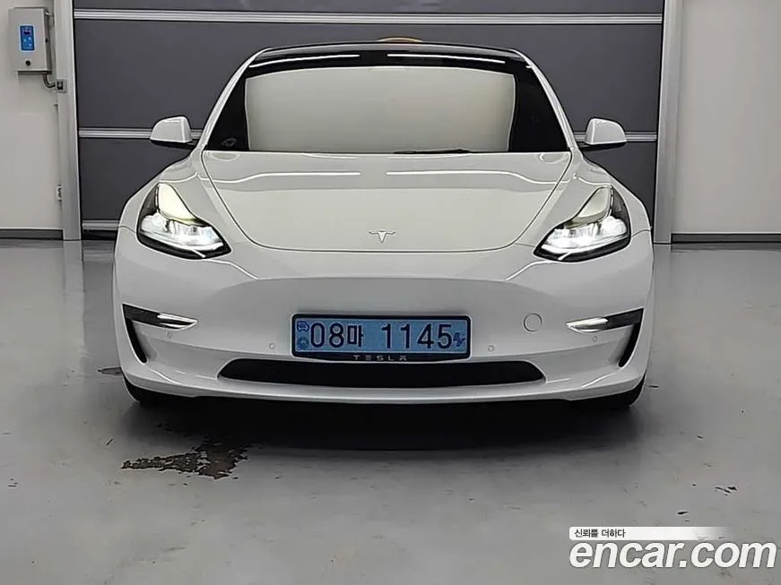 Tesla Model 3 — фото 5