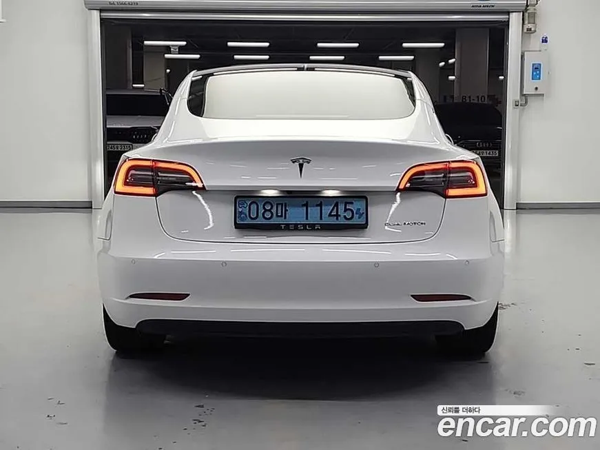 Tesla Model 3 — фото 3
