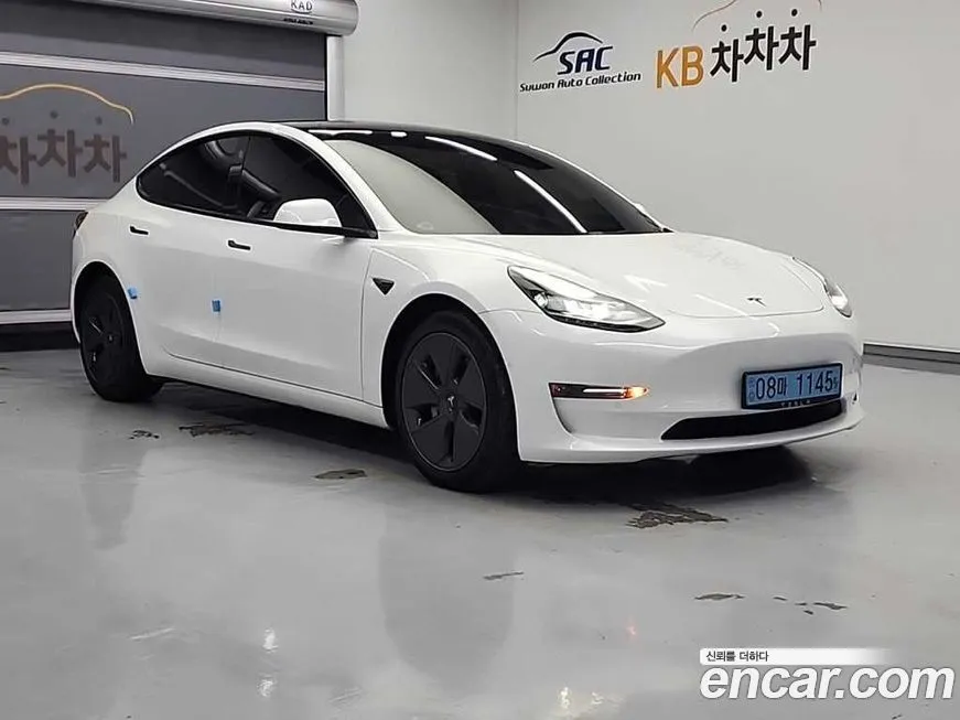 Tesla Model 3 — фото 8