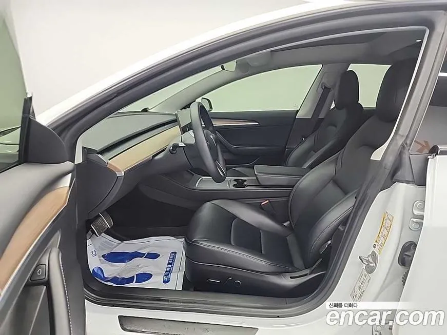 Tesla Model 3 — фото 10