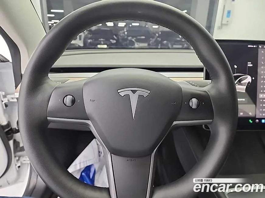 Tesla Model 3 — фото 7