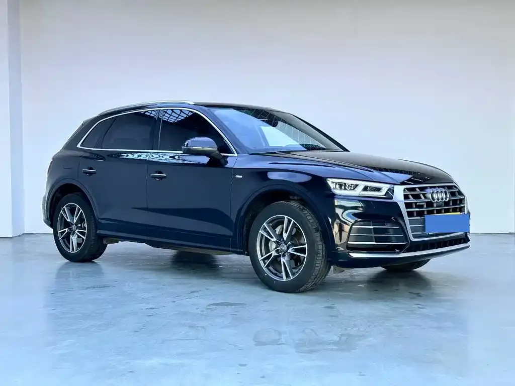 Audi Q5L — фото 8