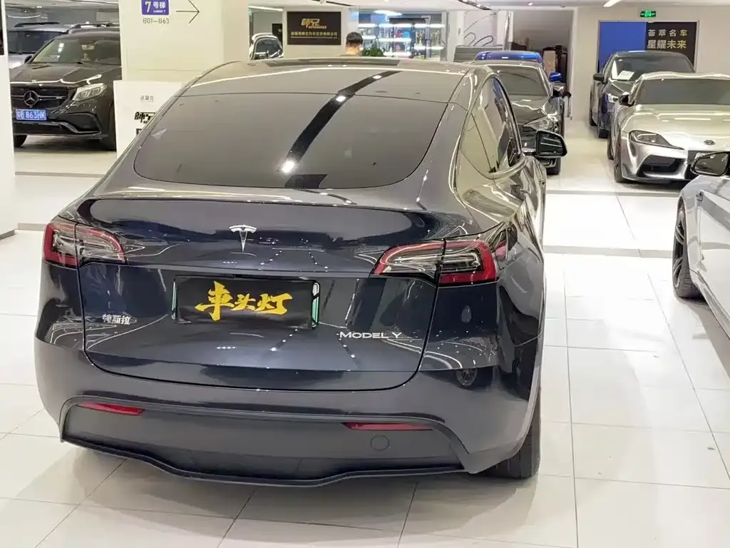 Tesla Model Y — фото 7