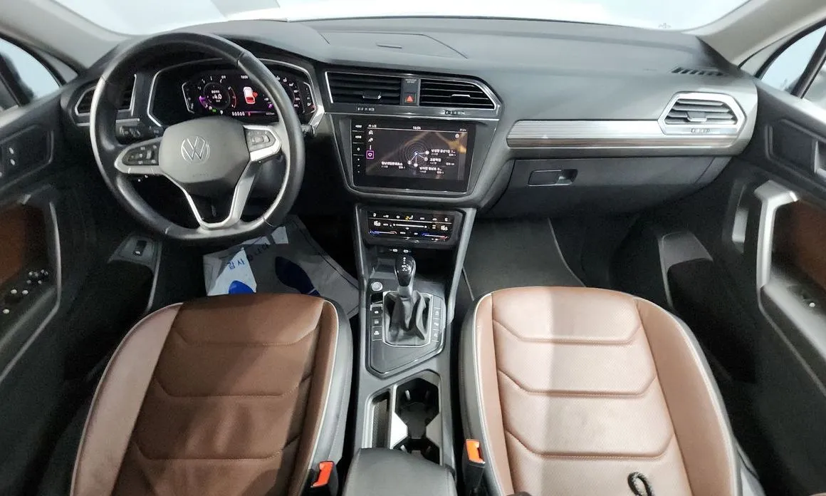 Volkswagen Tiguan — фото 10