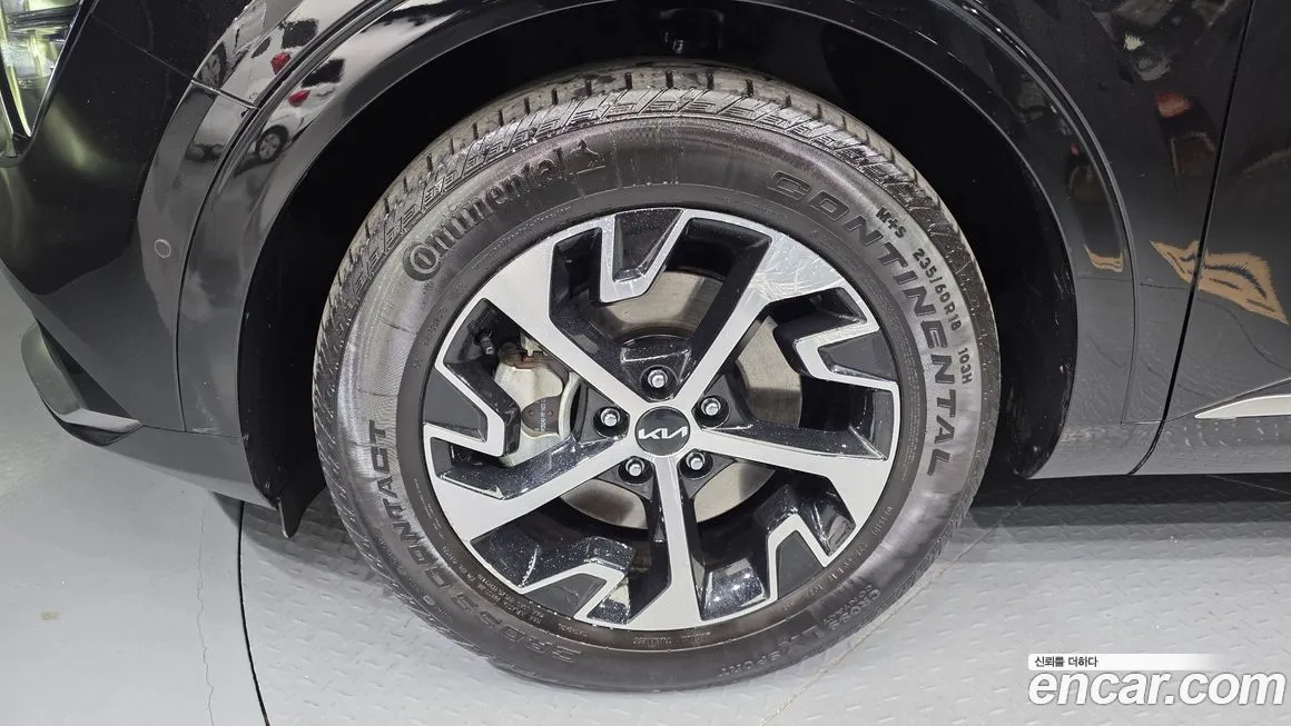 Kia Sportage — фото 10